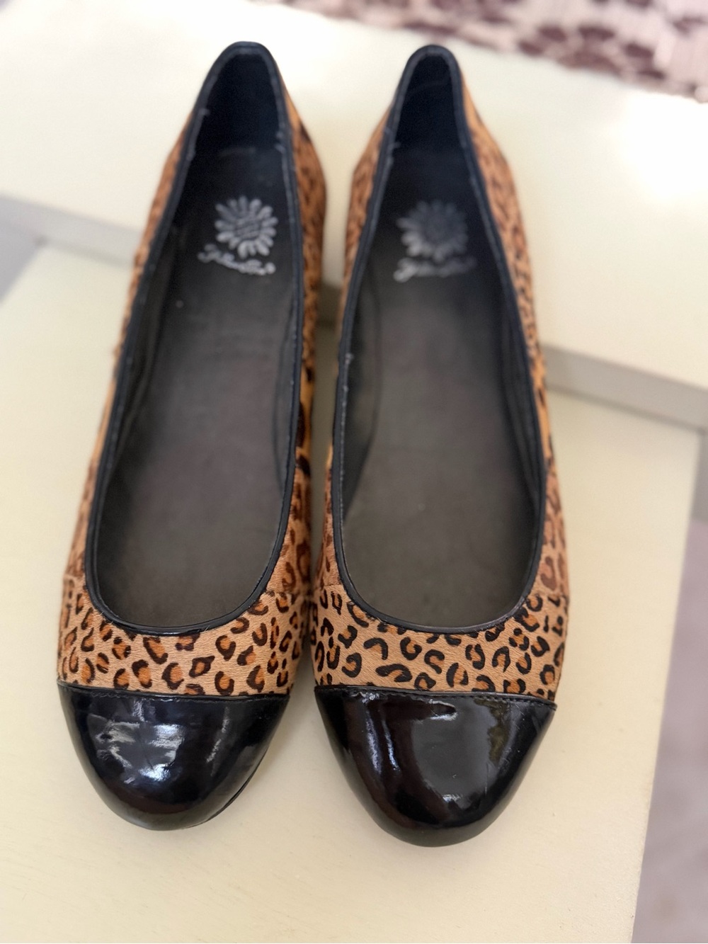 Yellow box animal print flats in multiple sizes